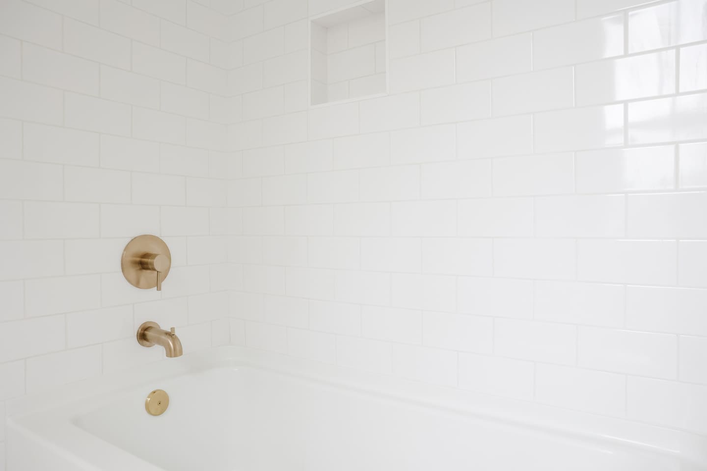 The spacious "sunrider room" features two queen beds, a spacious double-door closet, a full bath with a shower, smart TV and coastal photography. 