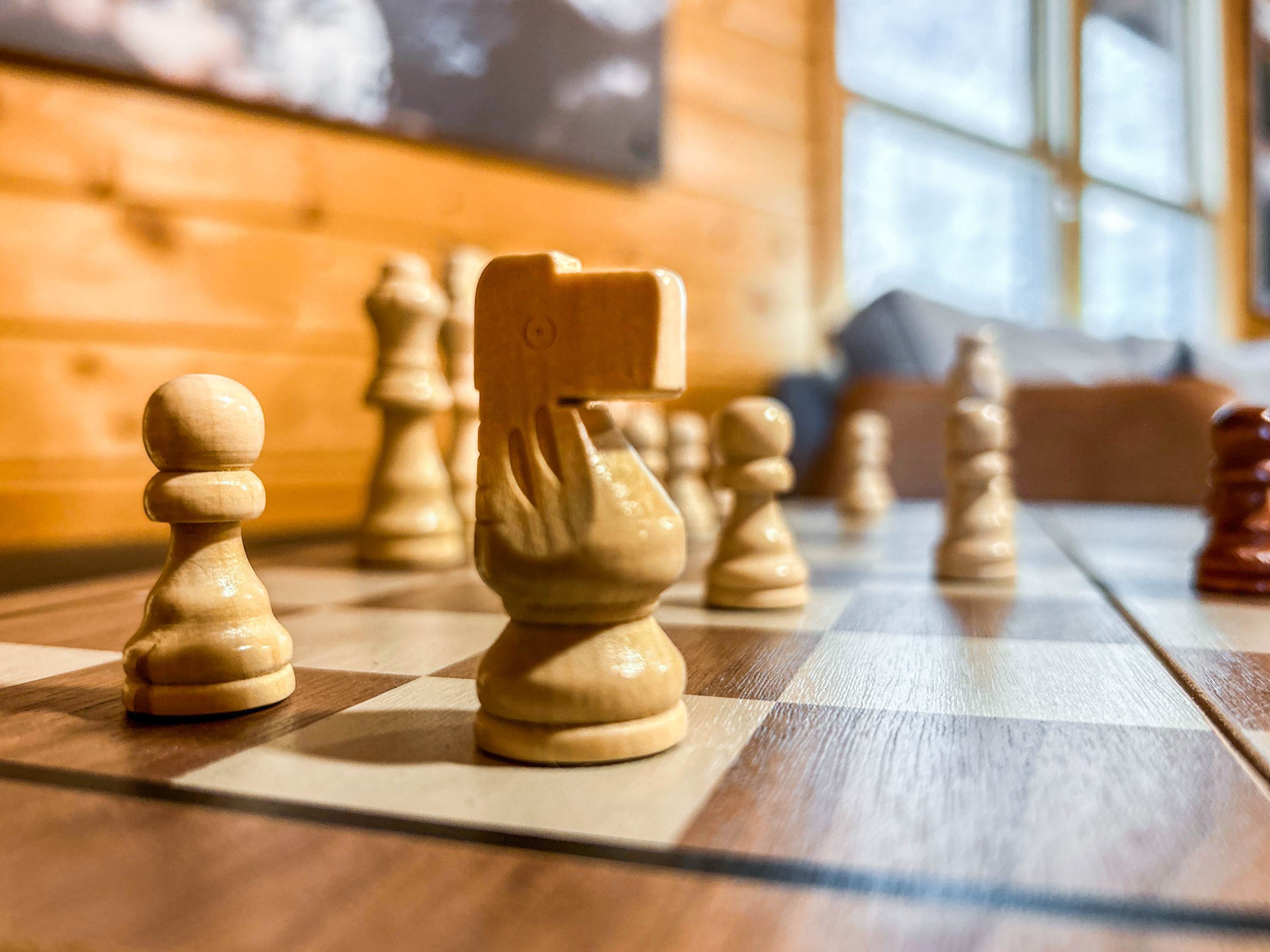 Our beautifully carved chess set is yours to play. Checkmate!