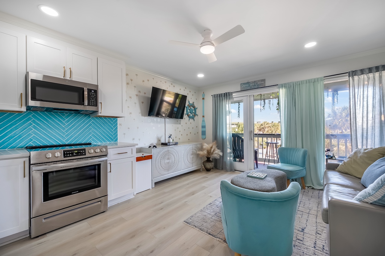 Kitchen & living room | Susu's Sea Cabin | 238C 1300 Ocean Blvd | Isle of Palms, SC | IOP Escapes