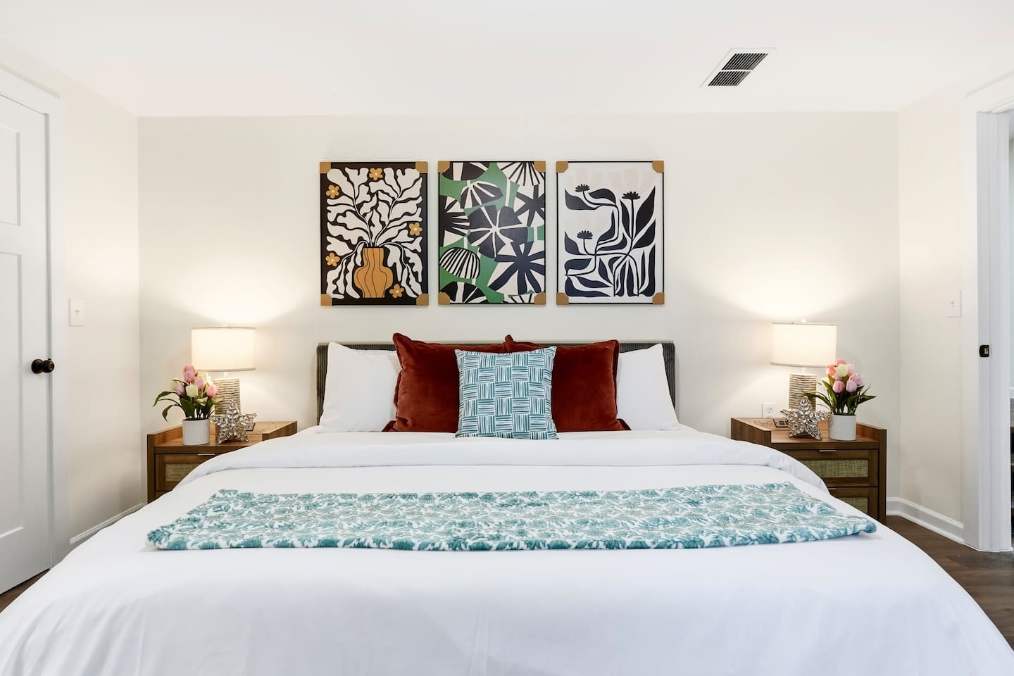 Finally, the basement bedroom features a beautiful, cool-toned color scheme with natural accents, a king bed, and a Roku-powered Smart TV. This room includes 2 full-body towels, 2 washcloths, and 2 hand towels for your stay.