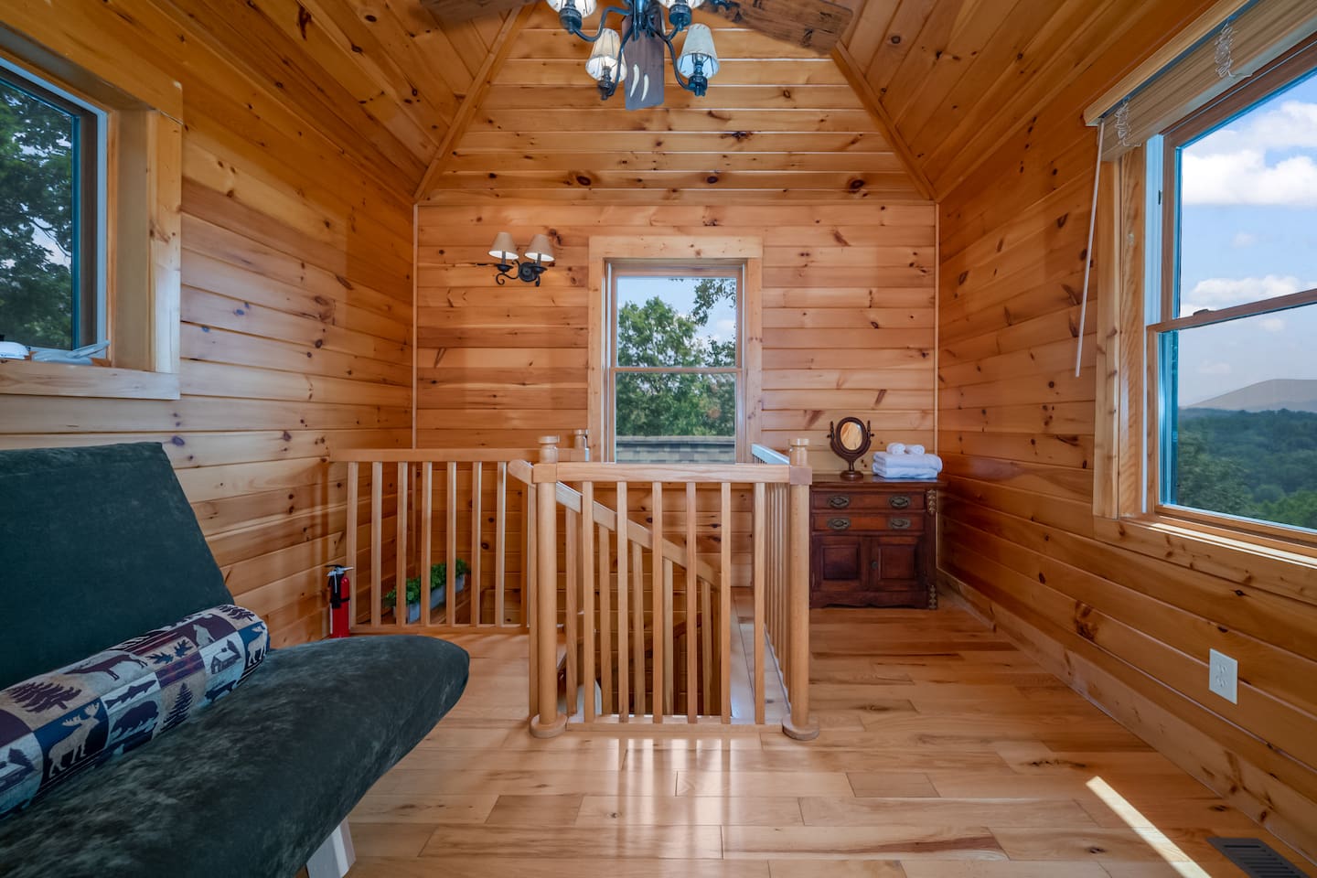 Loft bedroom #4 "Perch" upstairs with Queen size futon and incredible views of lake and mountains!
