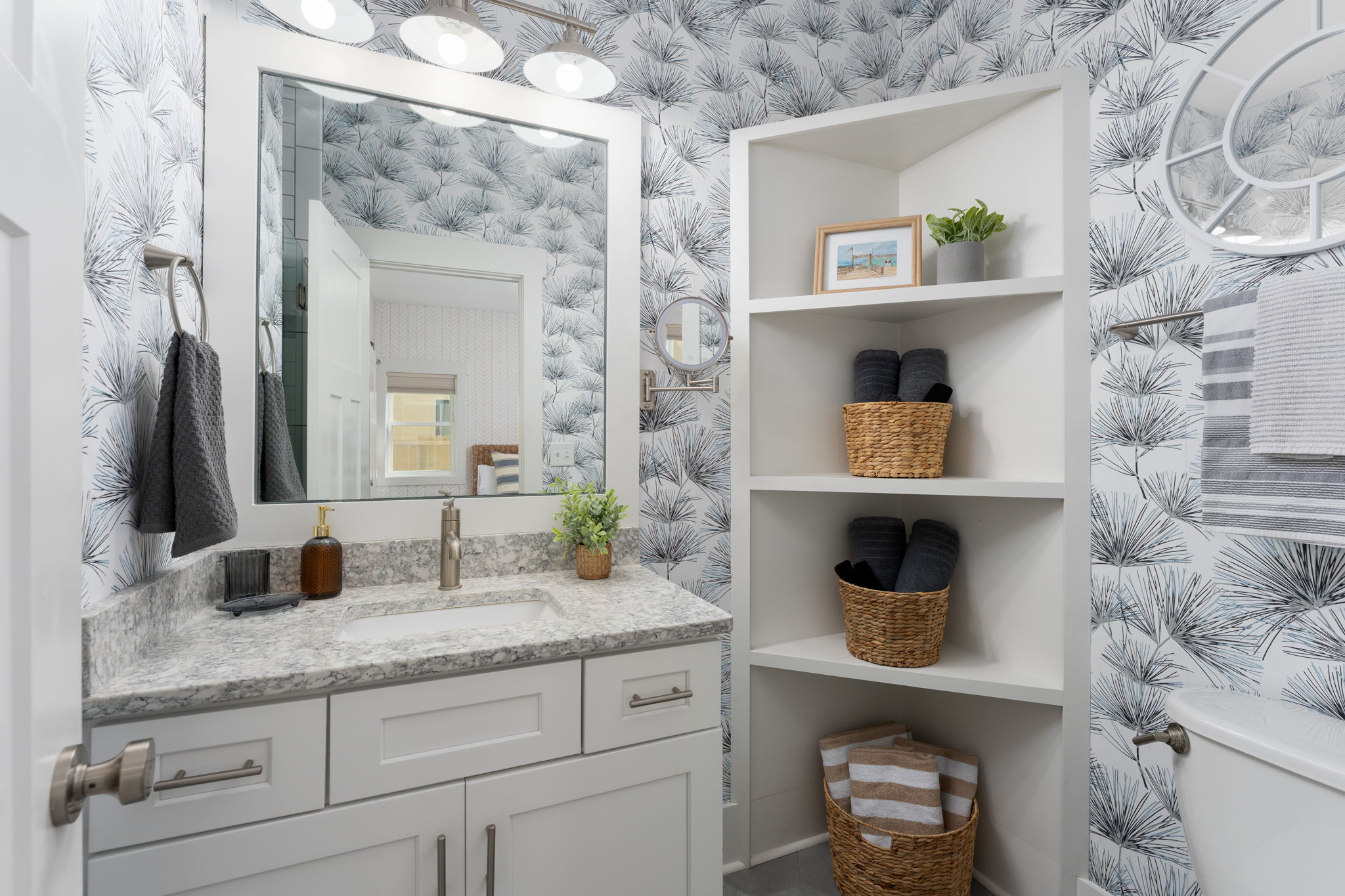 Private en suite bathroom with modern finishes, ample storage, and spa-inspired details and walk-in shower. 