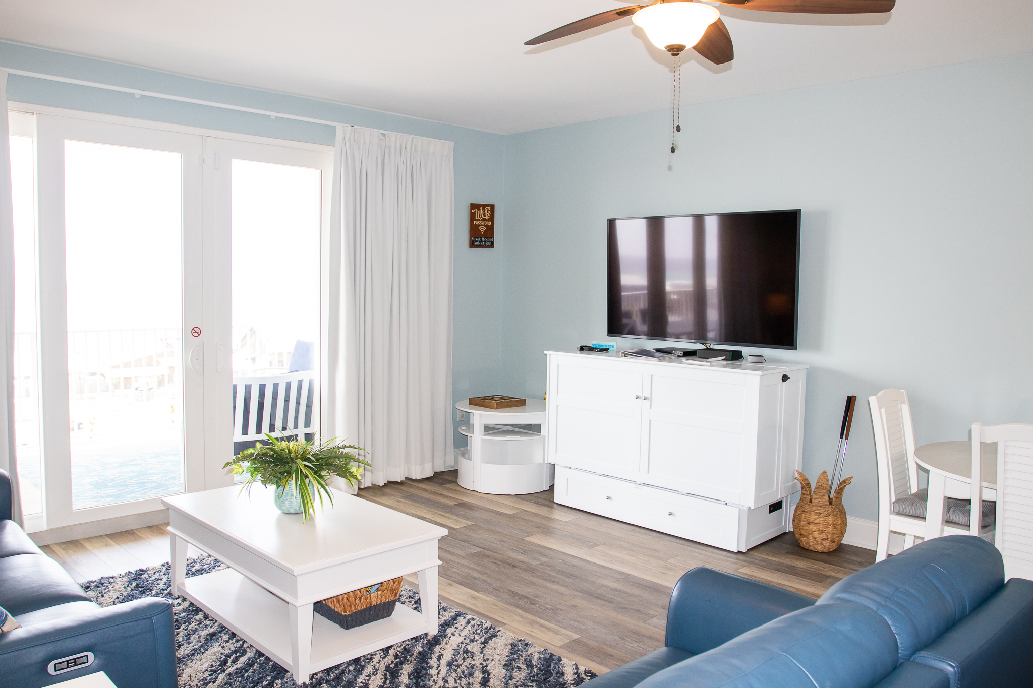 Queen Murphy Bed in living room, child's table, &a