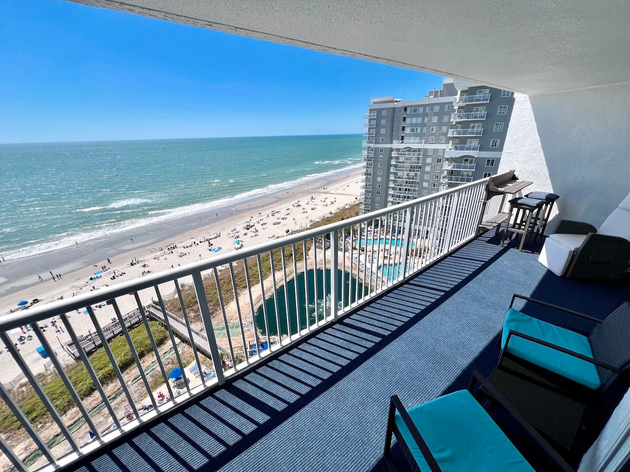 Spacious Private OceanFront Balcony with access from Living room and Master Bedroom. Outdoor chairs and bar top located on balcony as well