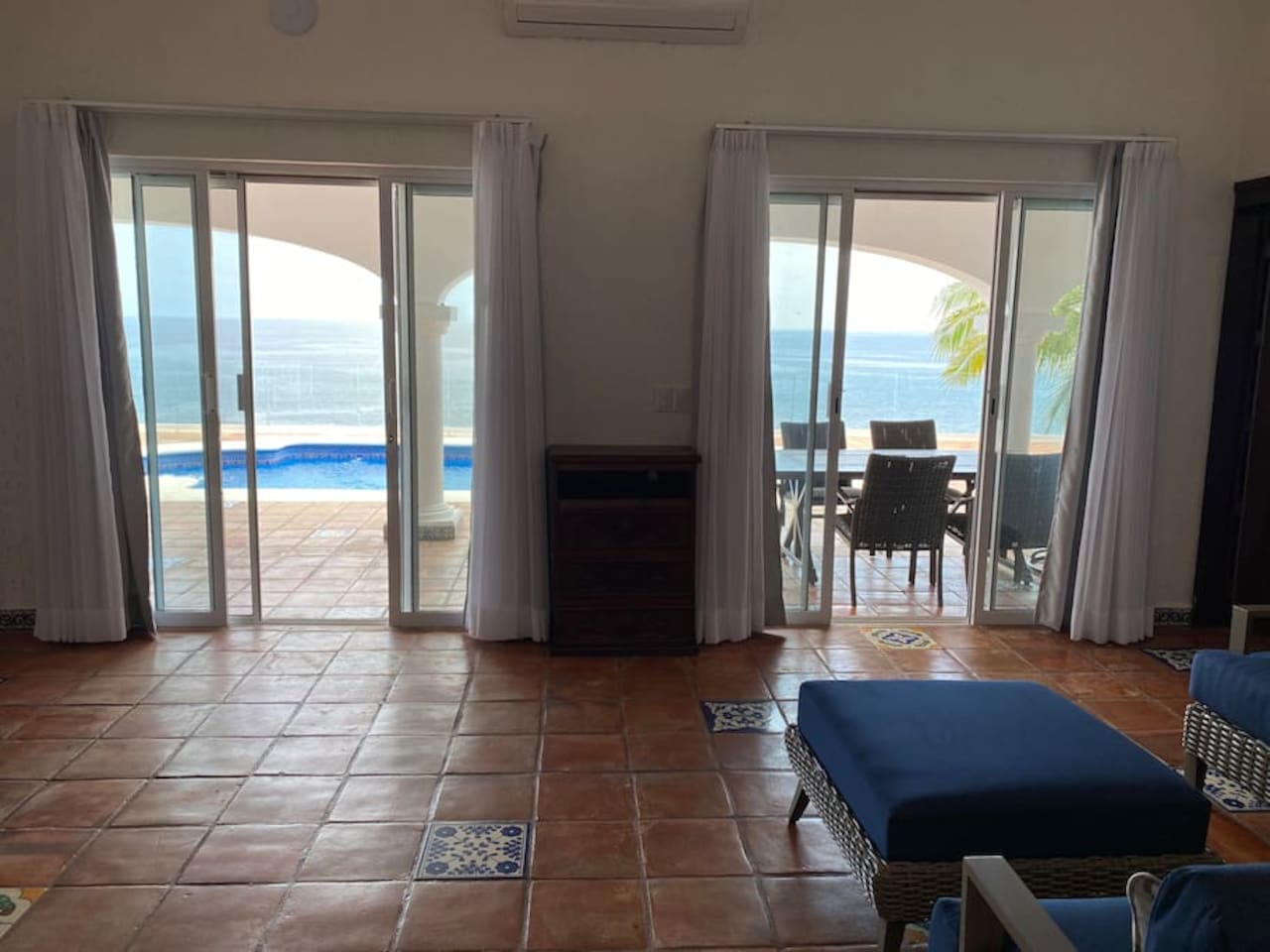 Views of the pool and ocean from living room 