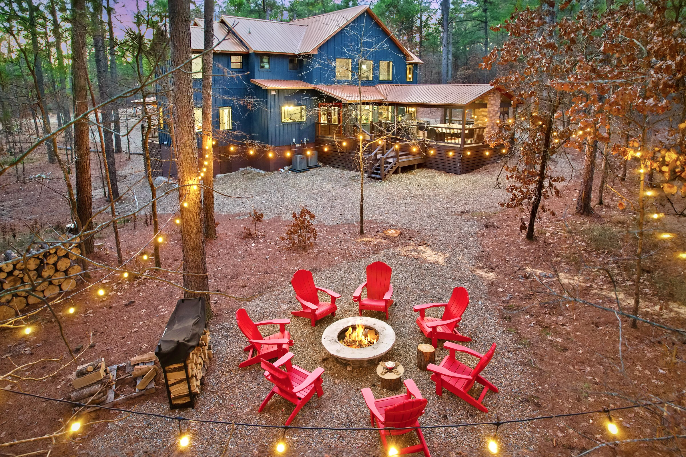 Cozy firepit nights under the string lights — guest favorite!