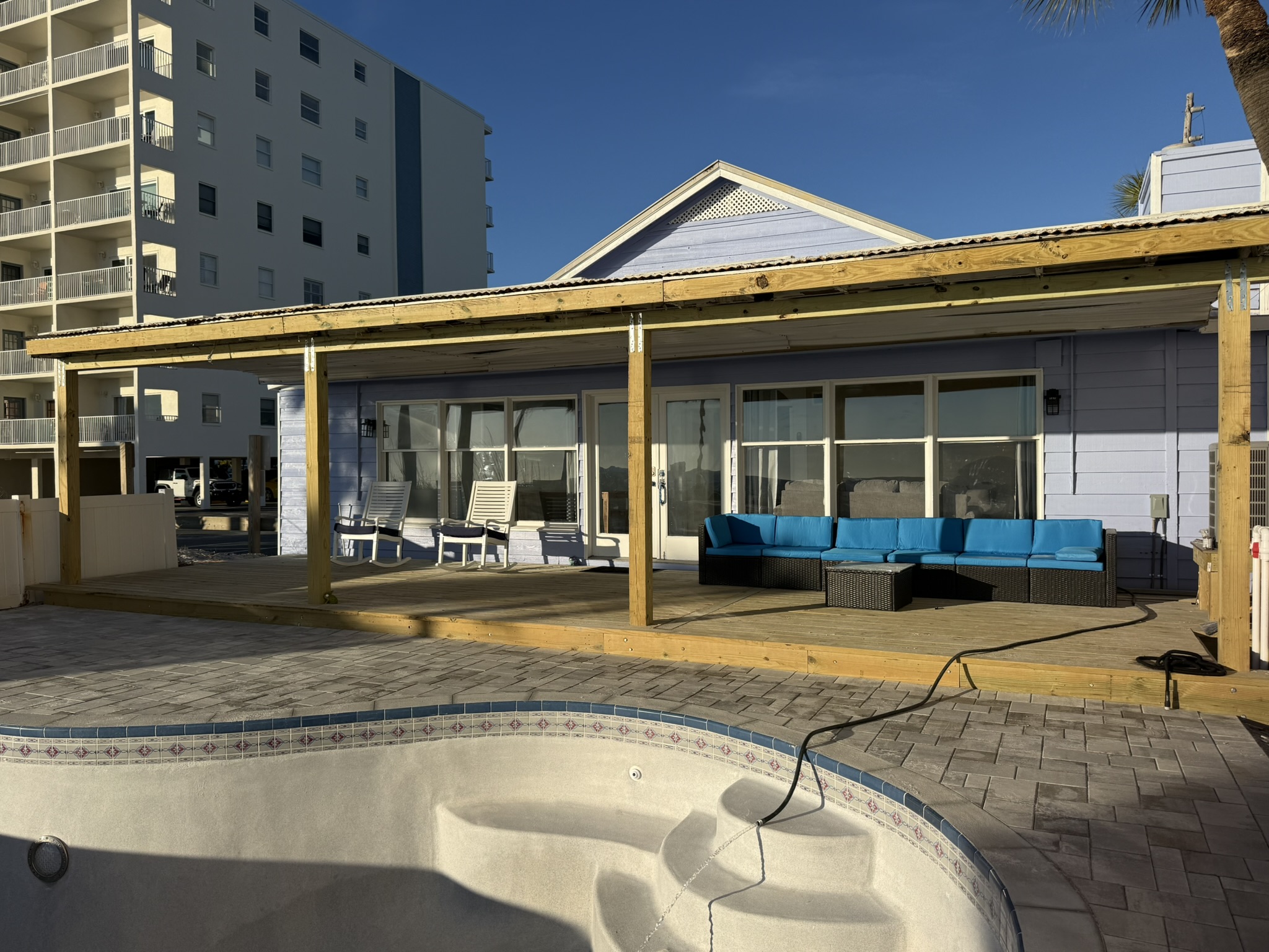 Large Private Deck with Rocking Chairs and Couch Seating.