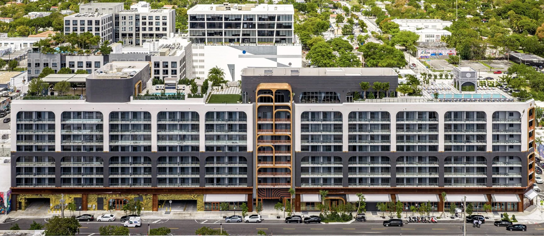 Architectural facade — designed by Lemay/Forma Group with sculpted balconies