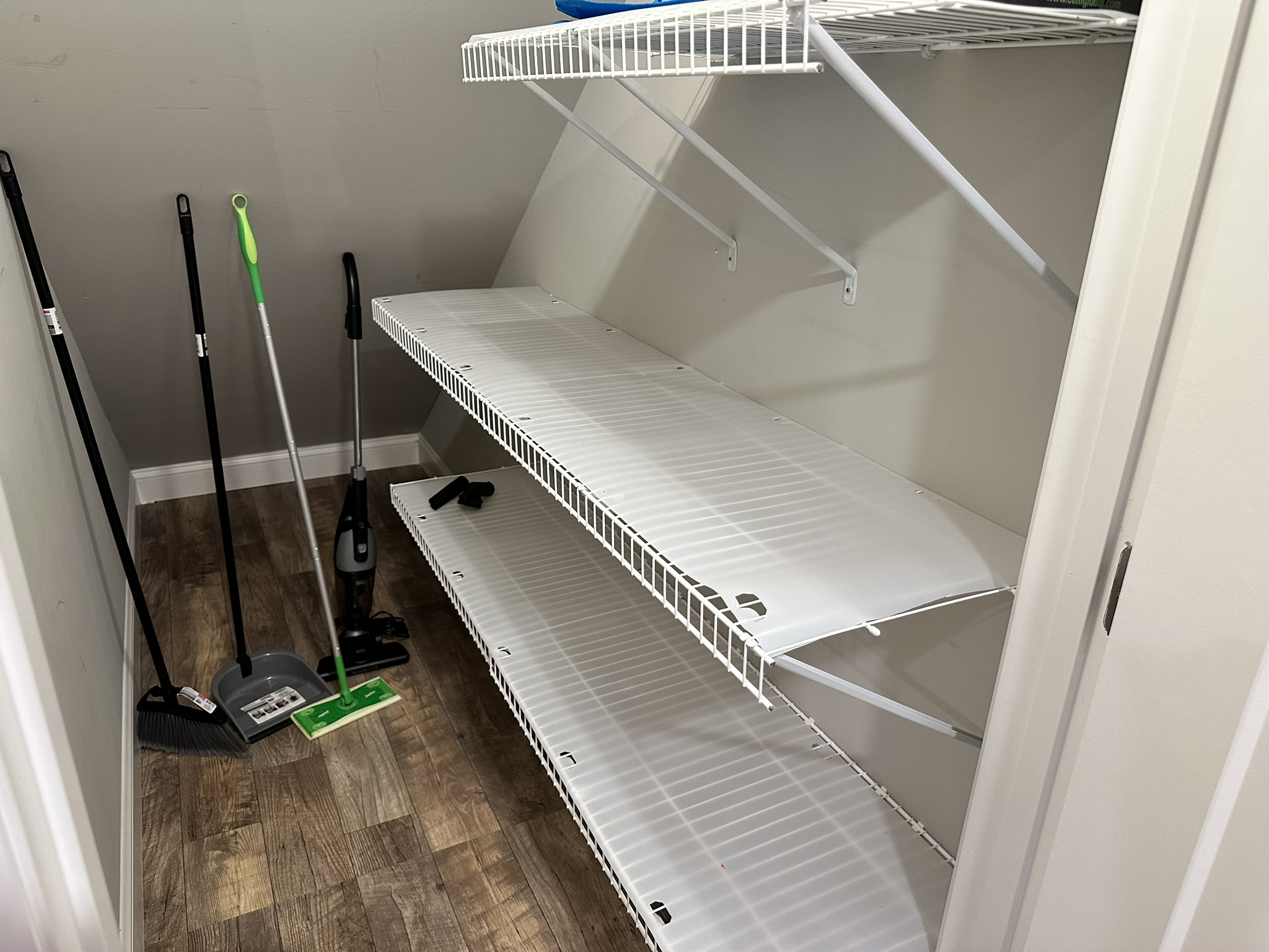 Large pantry with lots of shelving.