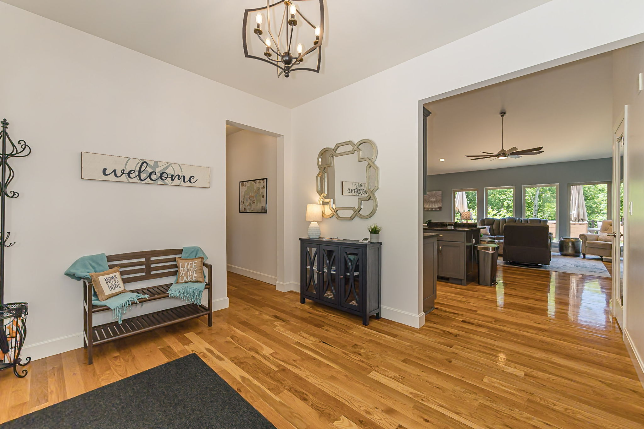 Step inside to a spacious, open floor plan designed for gathering. Half bath is through that short hallway