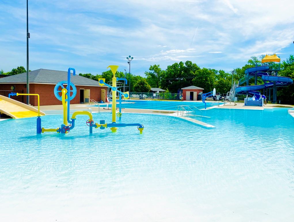 Aquatic Center open Memorial Day to Labor Day. $5/per day per person.  Just one block South of home.