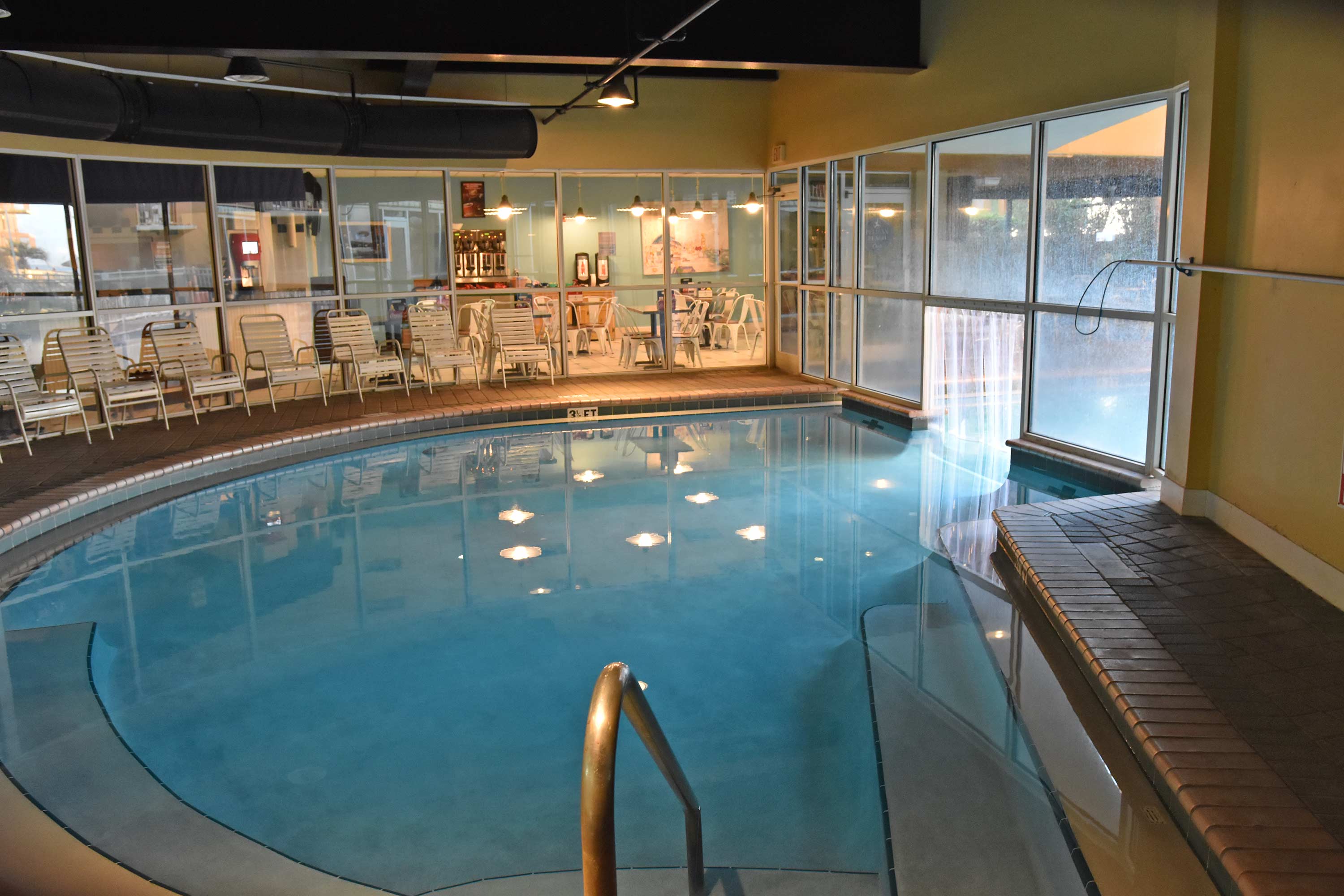 Heated pool that has access to outside pool