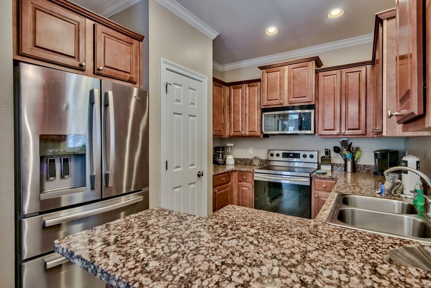 Kitchen has a full-sized refrigerator, coffee maker, stove, oven and more!  
All here to make meal prep a breeze!