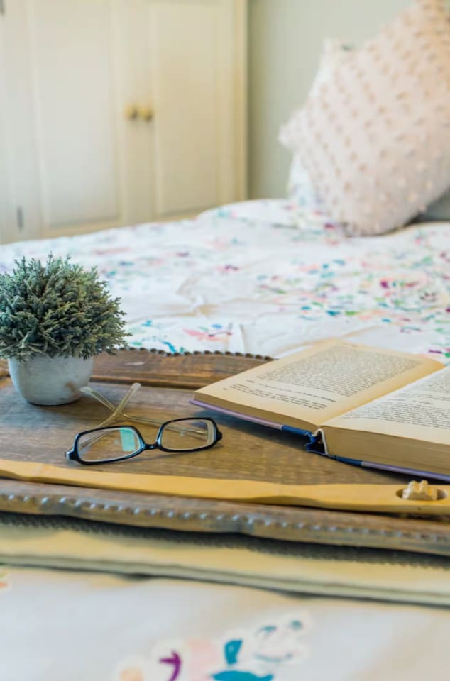 A quiet corner made for slowing down with a good book and a cup of tea.