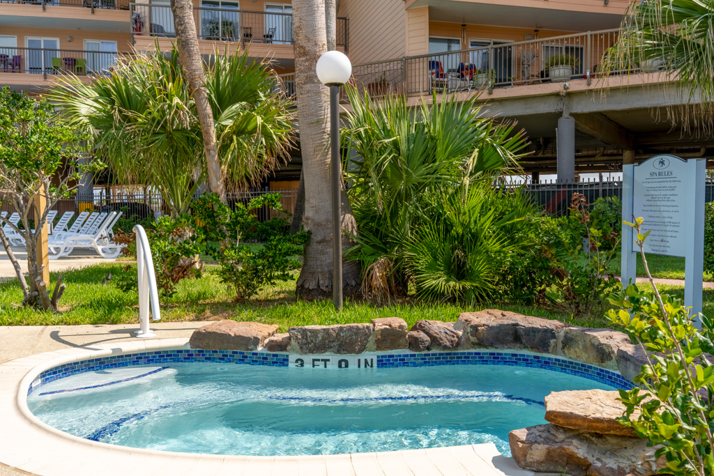 Between the beach entry pool and the "resort" pool