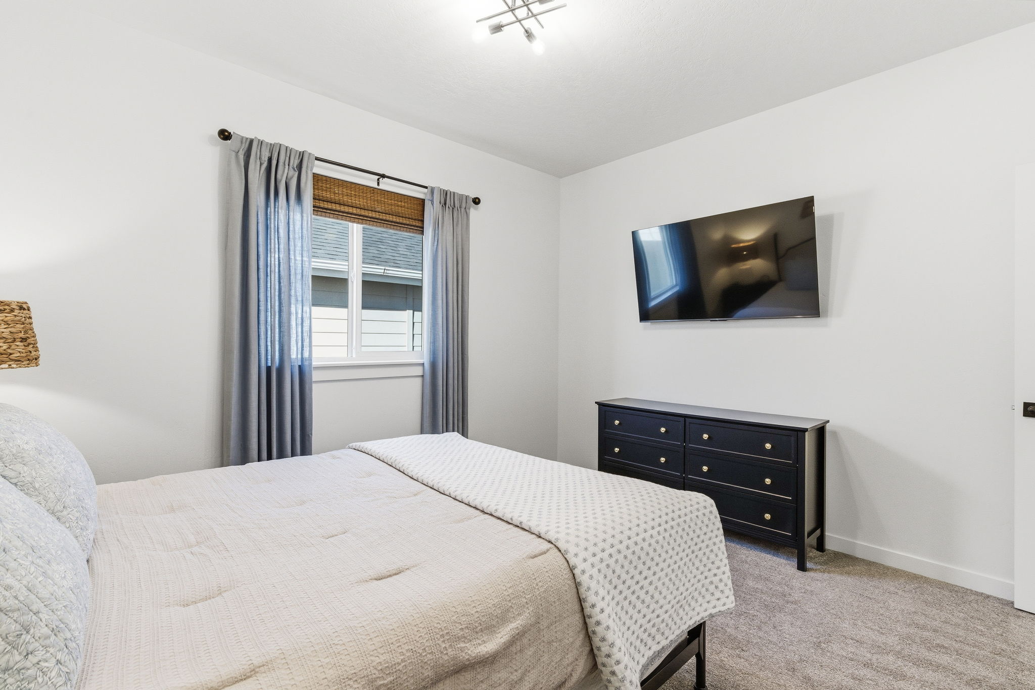 Sleep in, binge your favorite show, or simply enjoy the silence. This inviting bedroom was designed with comfort at the heart of every stay.
