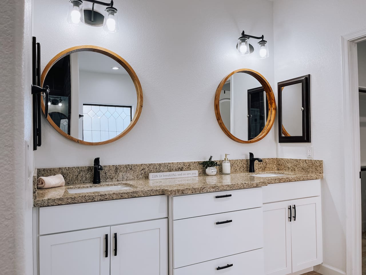 Master suite bathroom featuring dual sinks and ample counter space