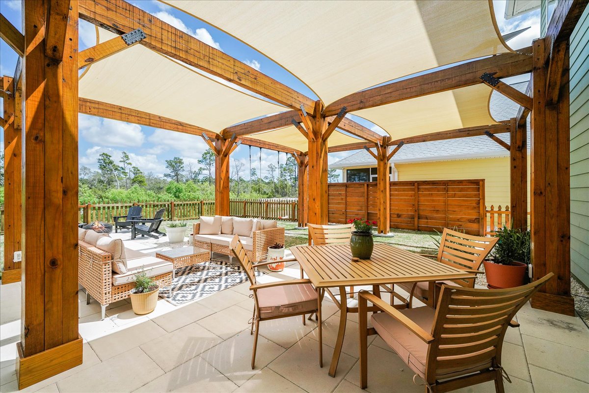 Enjoy the fresh air in this inviting outdoor seating area