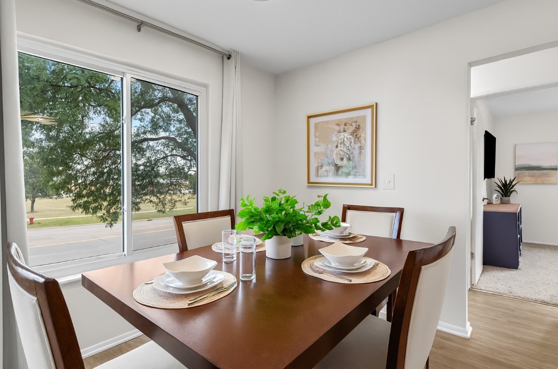 Open-concept layout connecting kitchen, dining, and living areas for effortless entertaining.