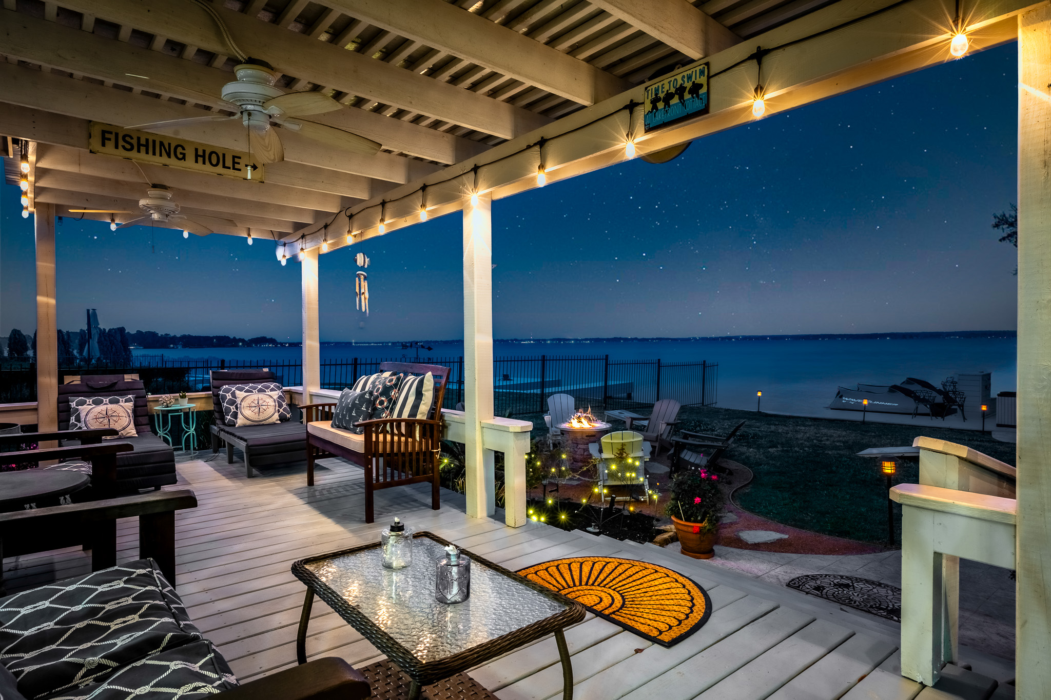 Kick back under the string lights and let the calm lake breeze, crackling fire, and starry skies melt your worries away.