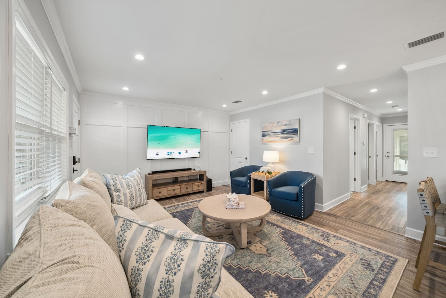 Living room of Unit B with a sleeper sofa. 