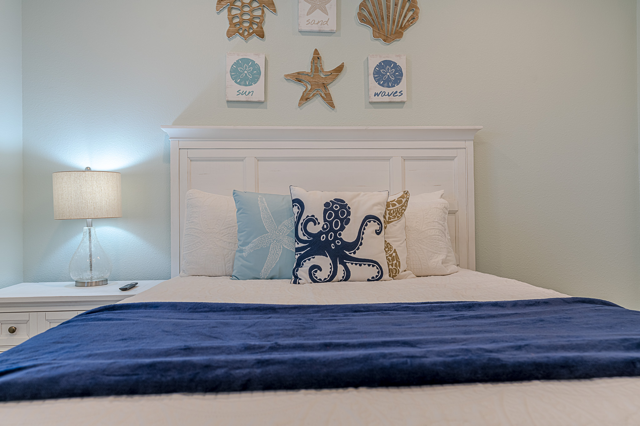 Relax in the coastal decor in one of the four bedrooms.