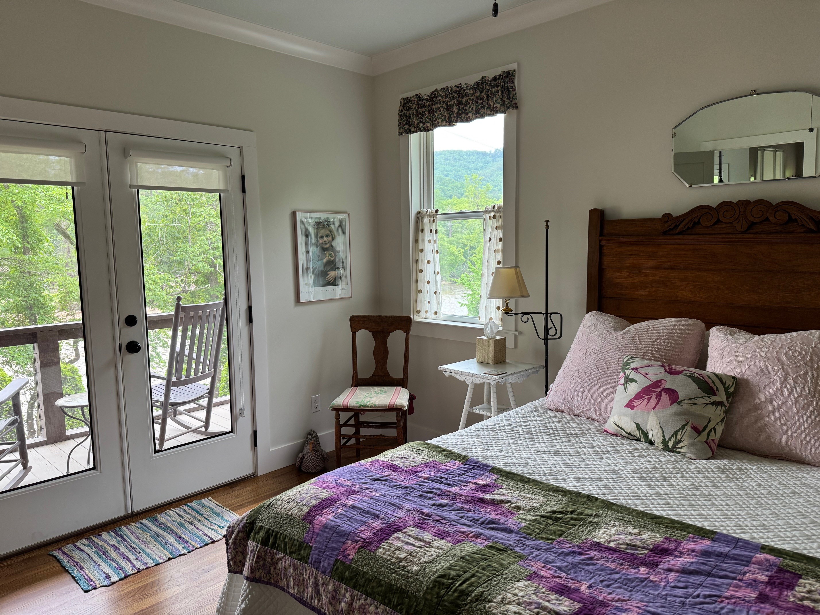 Comfy furnishings create a relaxed and personal feel in the downstairs bedroom