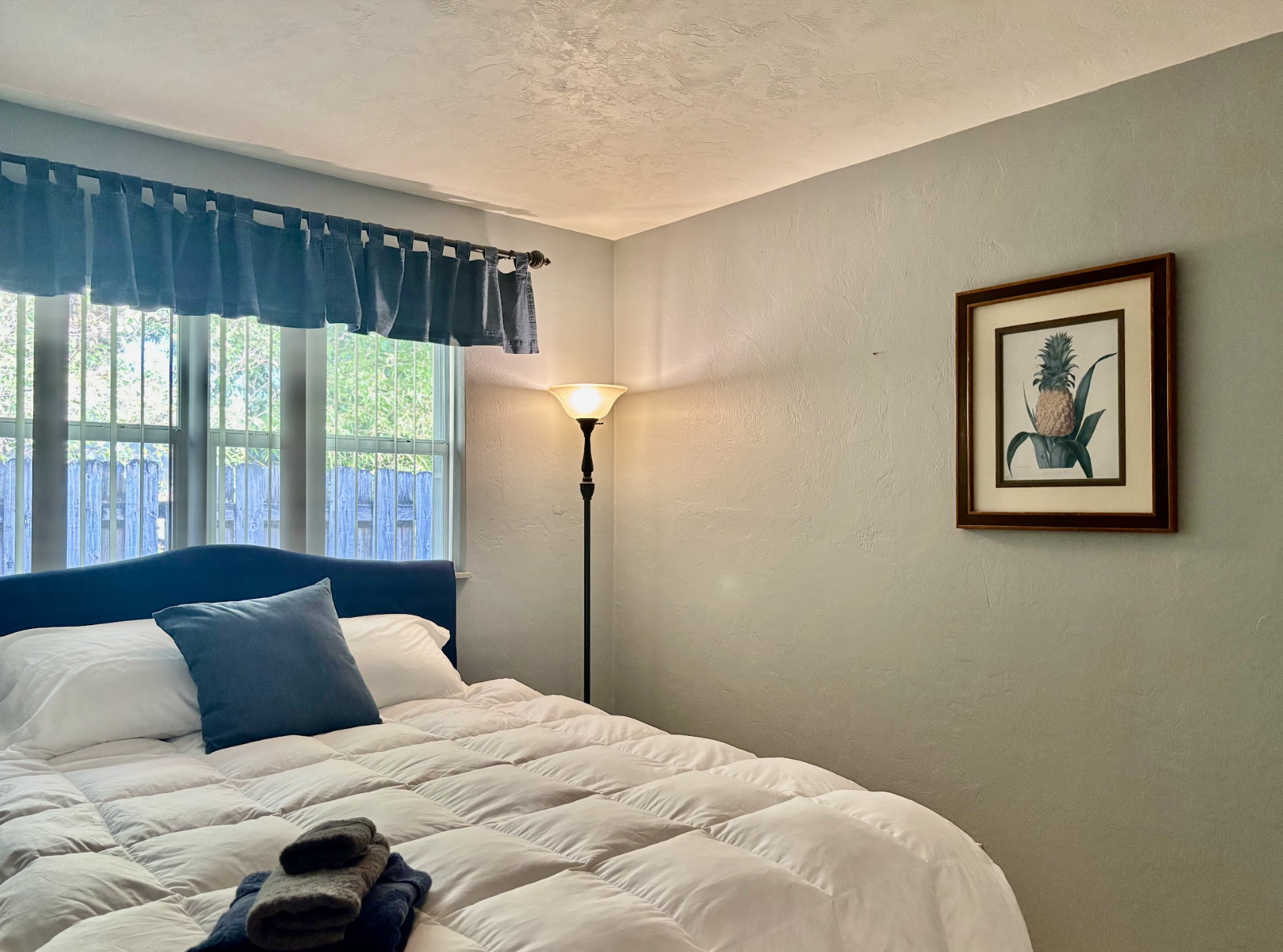 Our second bedroom is comfortable with plenty of closet space.