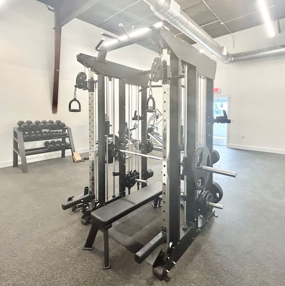 The community gym is well-equipped for your workout, including a variety of free weights and a multi-purpose rack.