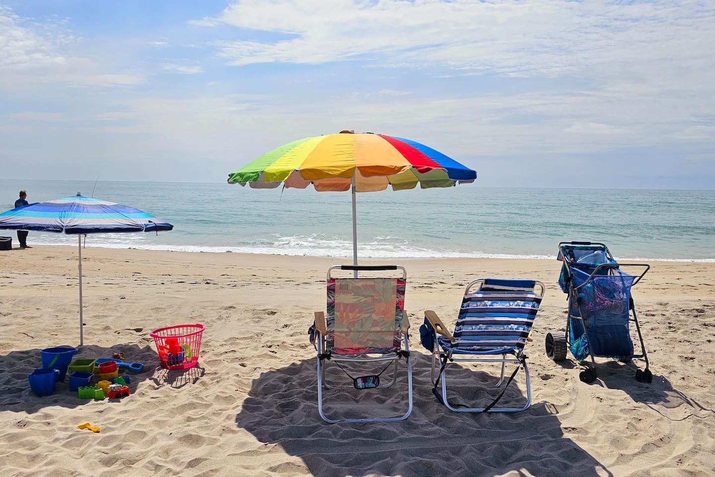We provide toys, chairs and umbrellas.
