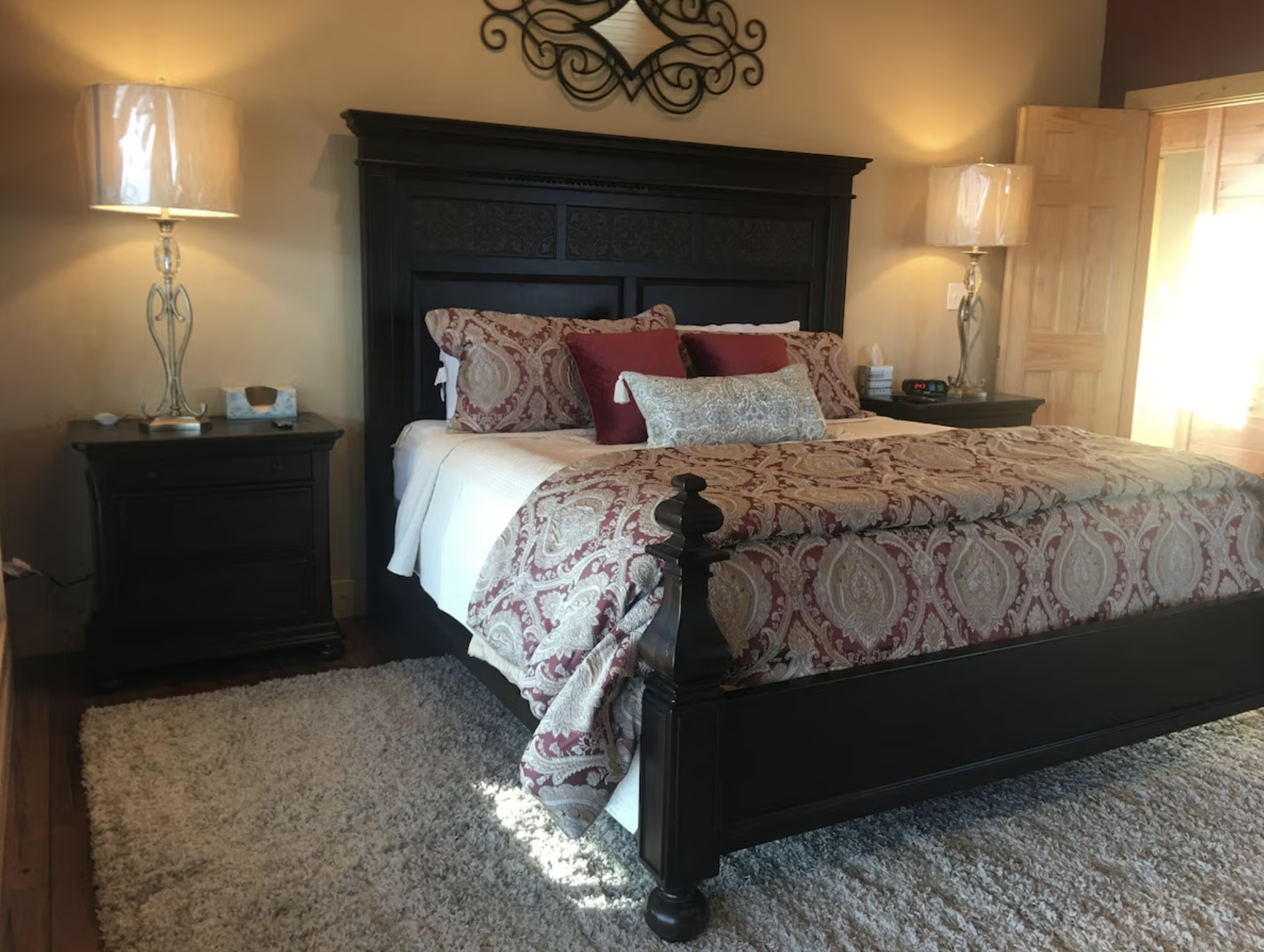 The Primary Bedroom has a large king bed