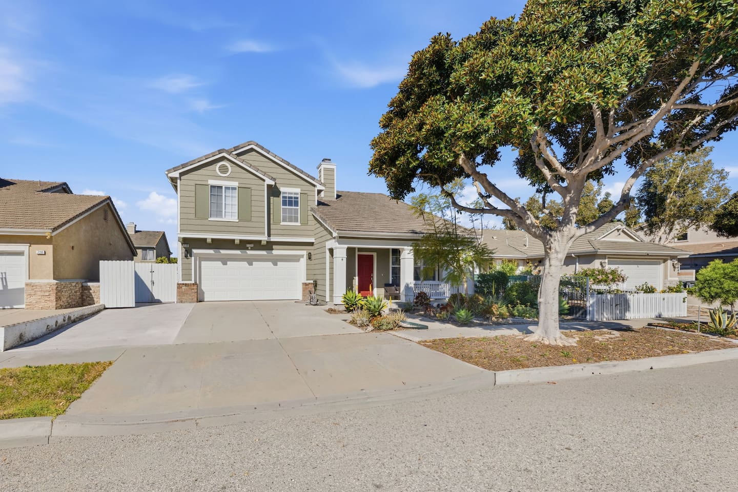 Spacious 4-bedroom Oxnard vacation home with fenced yard, driveway parking for 3 cars, and quiet residential street. Near Channel Islands Harbor, beaches, and Ventura.