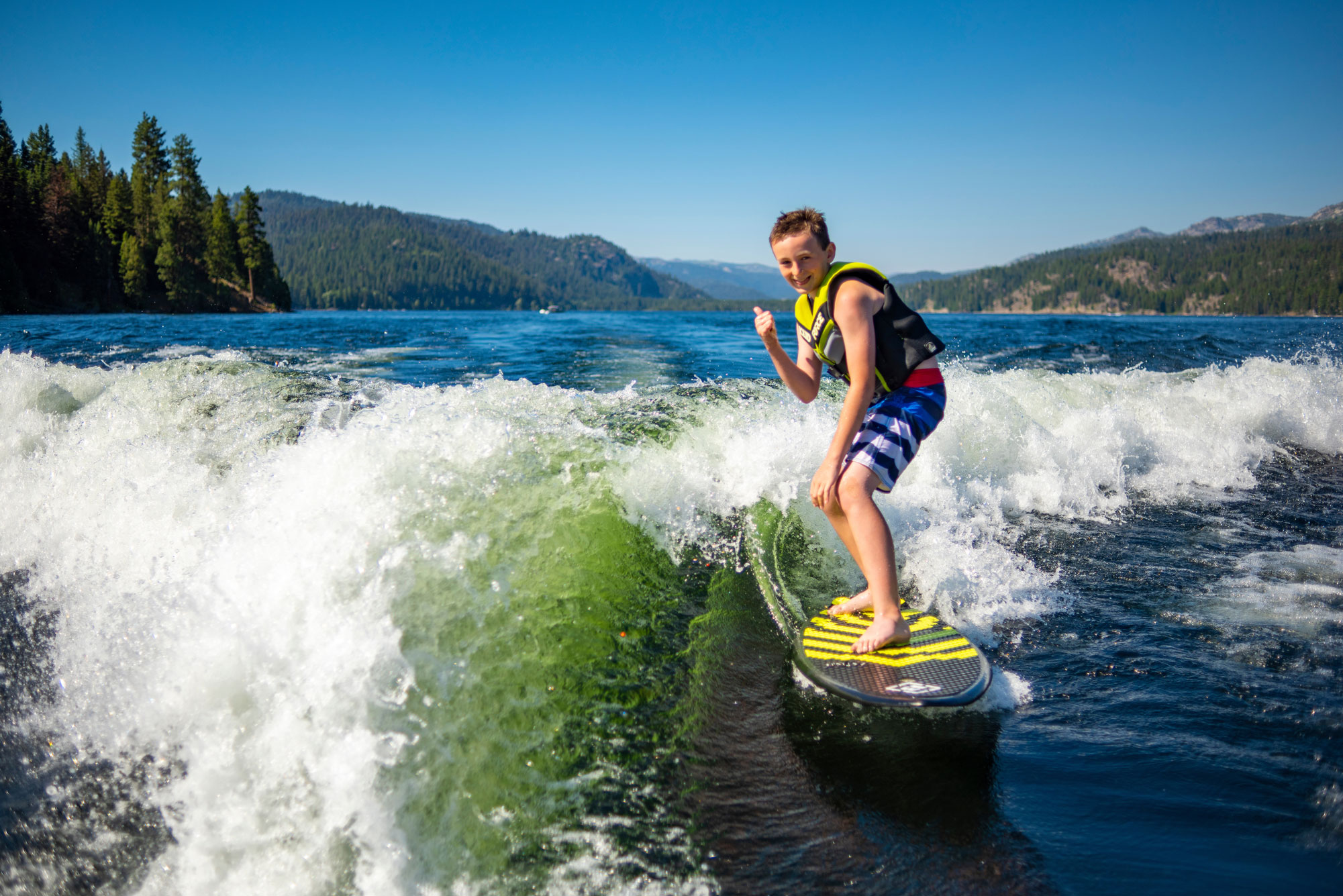 Wake surfing on Payette Lake — McCall Idaho family vacation rental sleeps 10