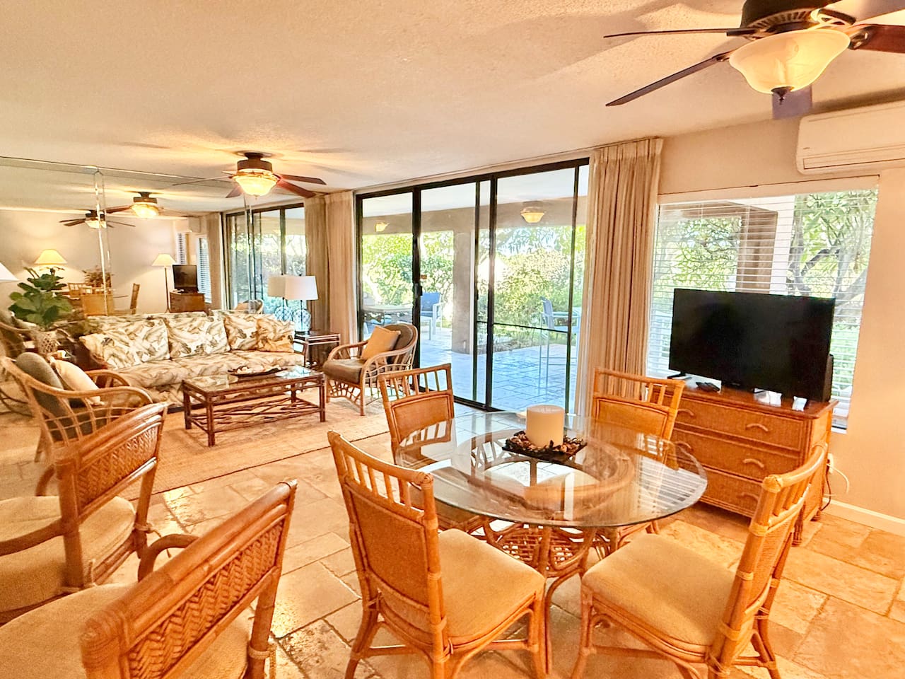 The open concept seamlessly connects the dining and living areas, creating a bright, airy space perfect for gathering.