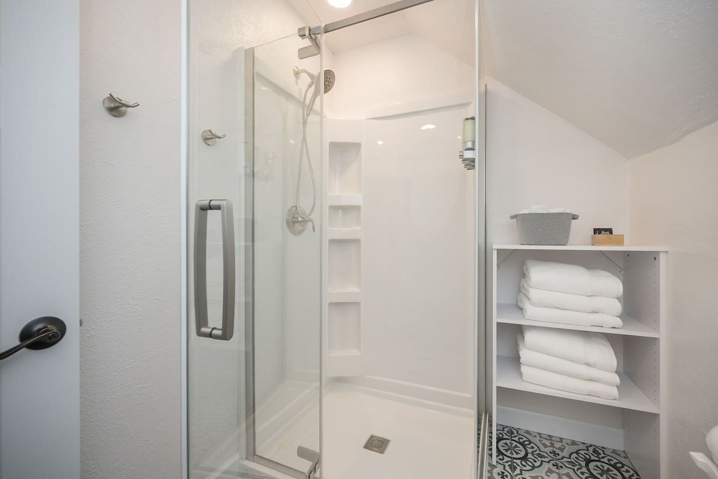 The beautiful shower has great water pressure.