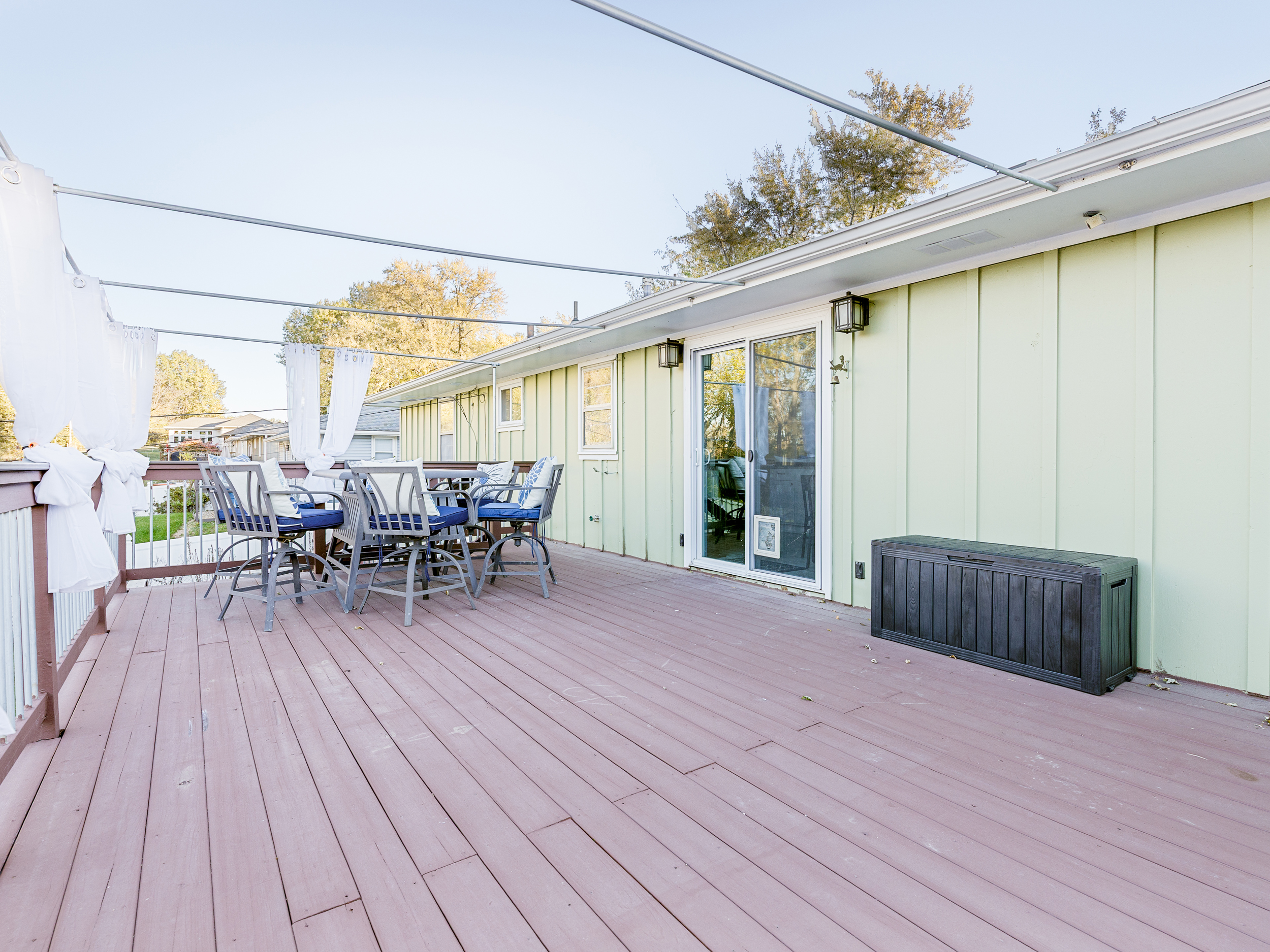 Alternate deck view featuring generous space and curtain system for added privacy.