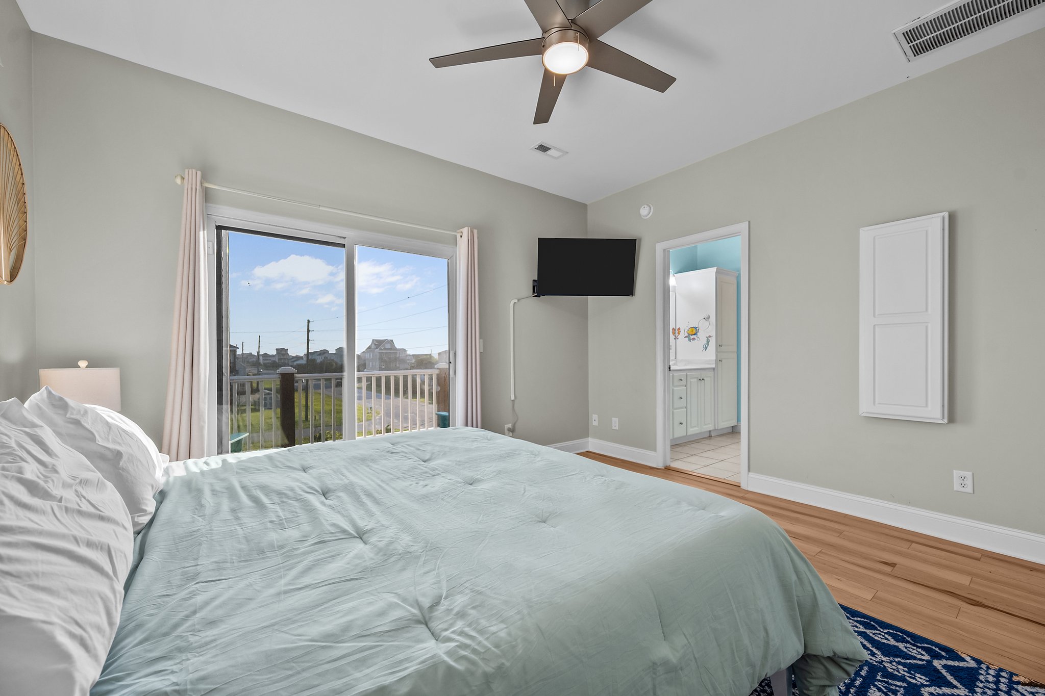 Top floor bedroom with king bed and ensuite bathroom