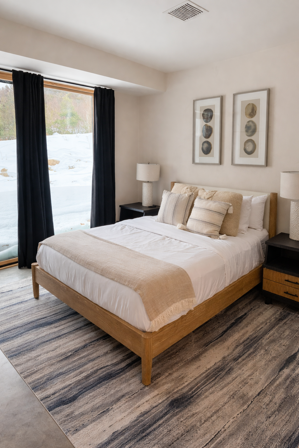 First-floor queen bedroom with sliding glass doors