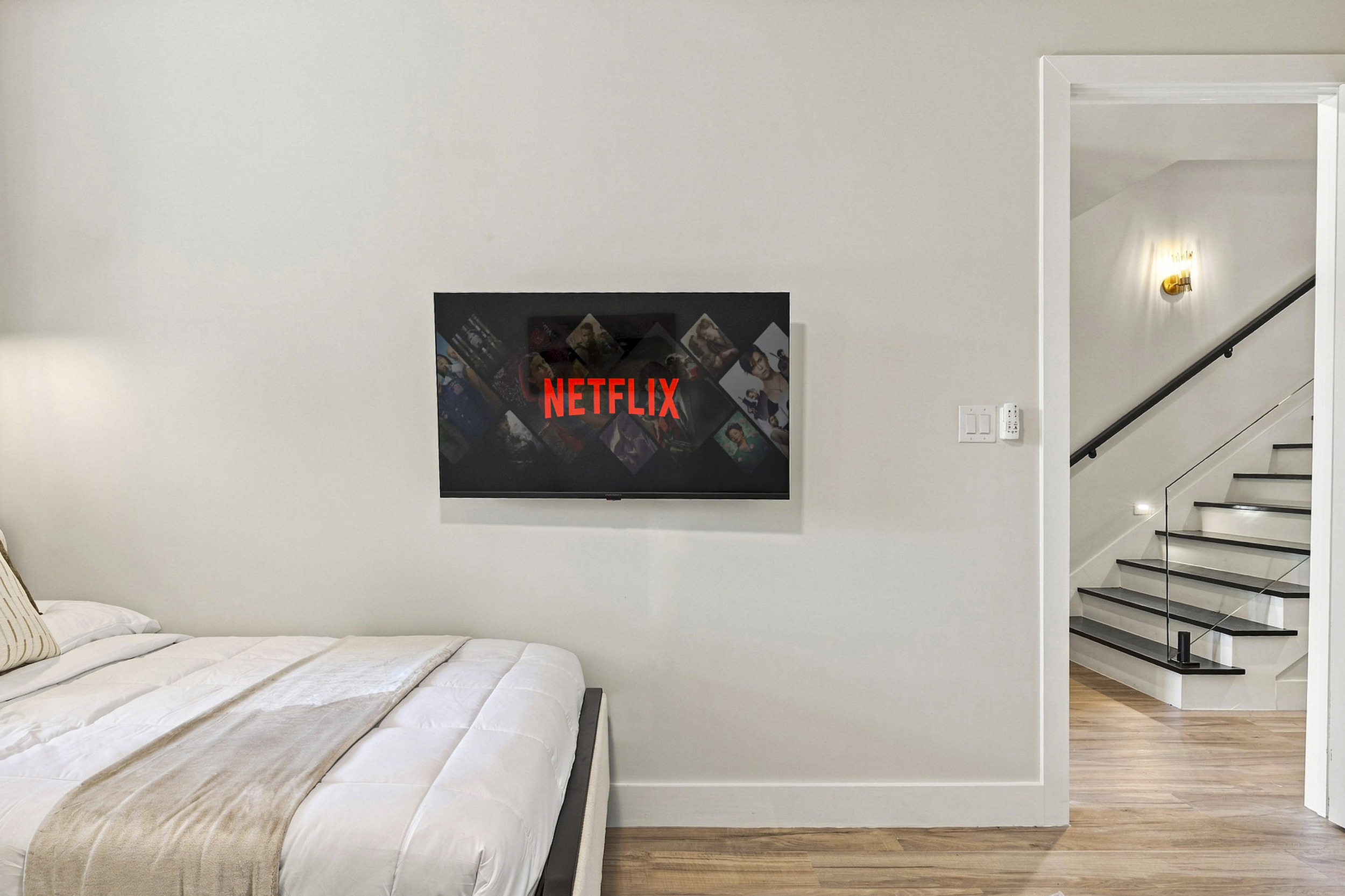 Unwind with Netflix and enjoy sleek, modern decor just steps away!