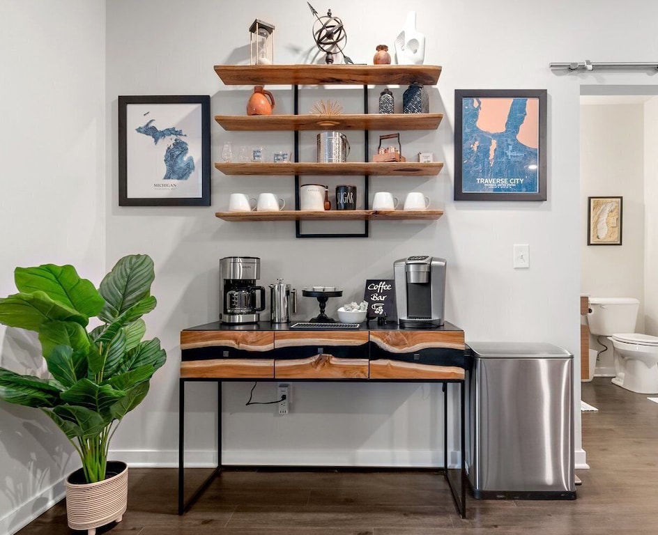 A fully loaded coffee bar includes: K cups, grounds, sugar, stevia, and creamers