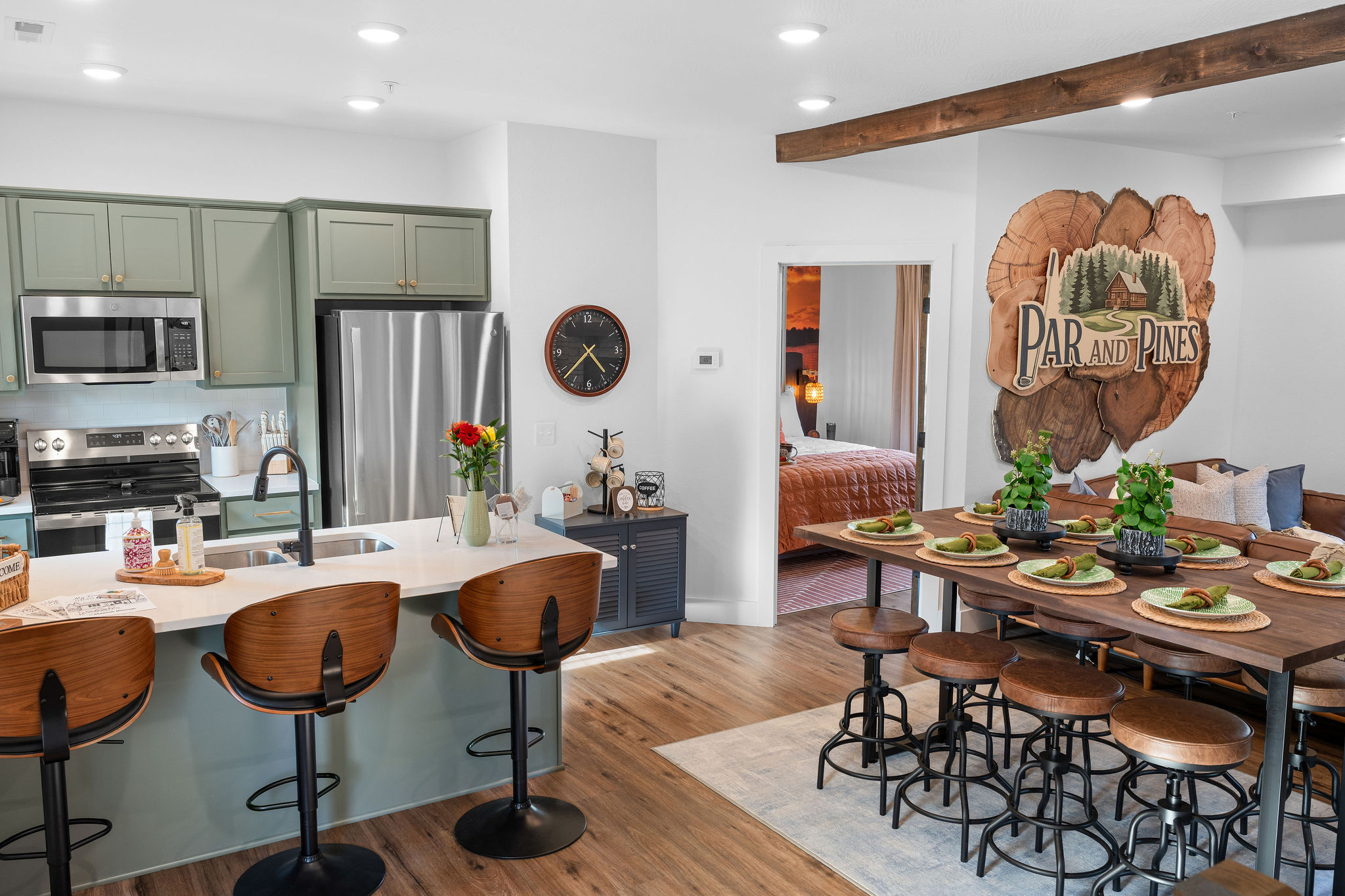 A fully-stocked kitchen and dining area for preparing meals together, enjoying time and laughing while eating cooked meals or takeout pizza from the general store.