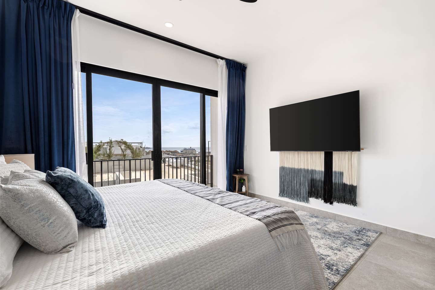 Unwind with in-bed entertainment on a 65-inch Samsung TV or savor stunning views of cruise ships and sailboats gliding through the Cabo marina and Sea of Cortez from your cozy bed. Book now for this exclusive experience!