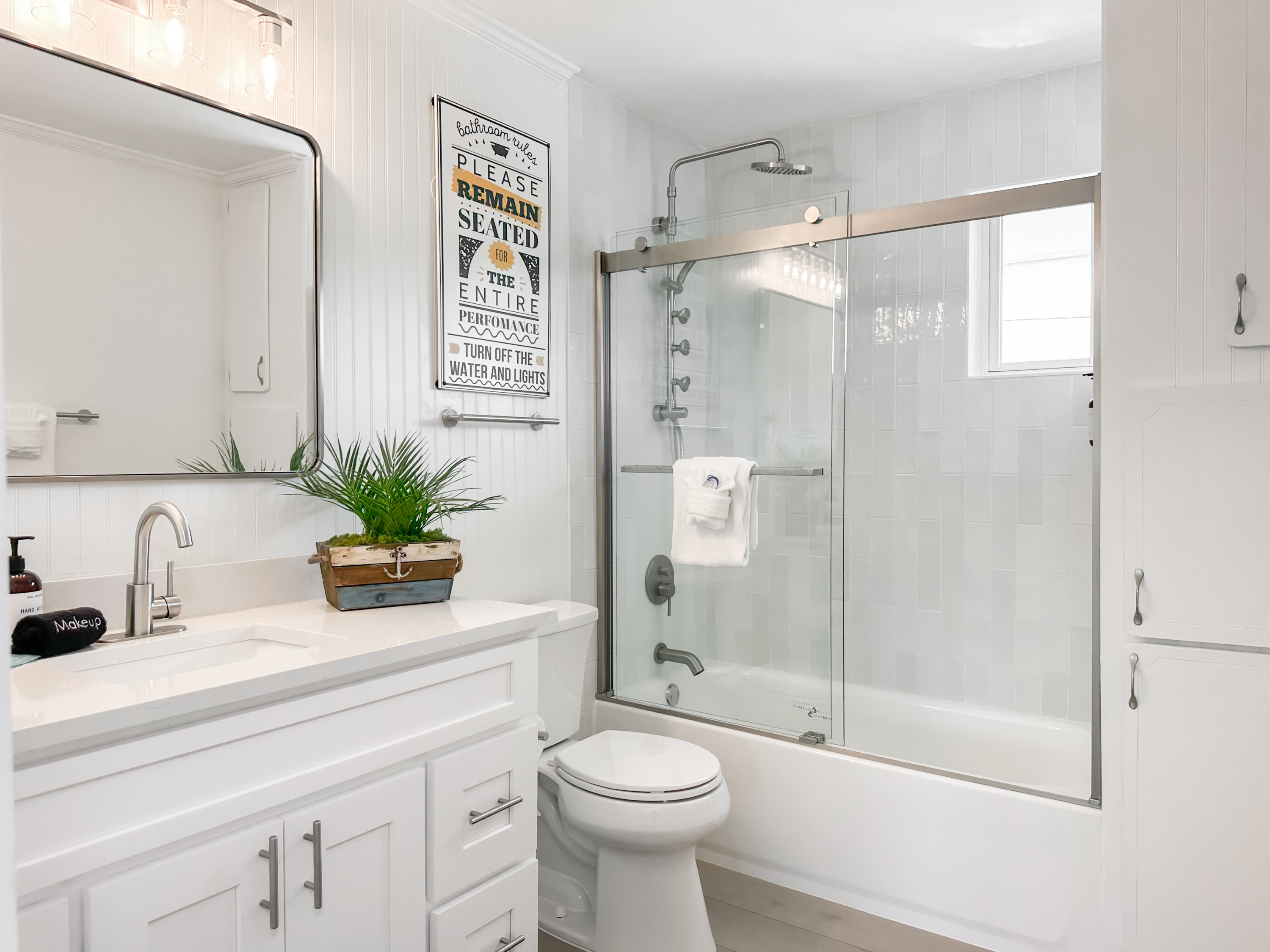 There’s shower/tub combo with a rainfall shower head.