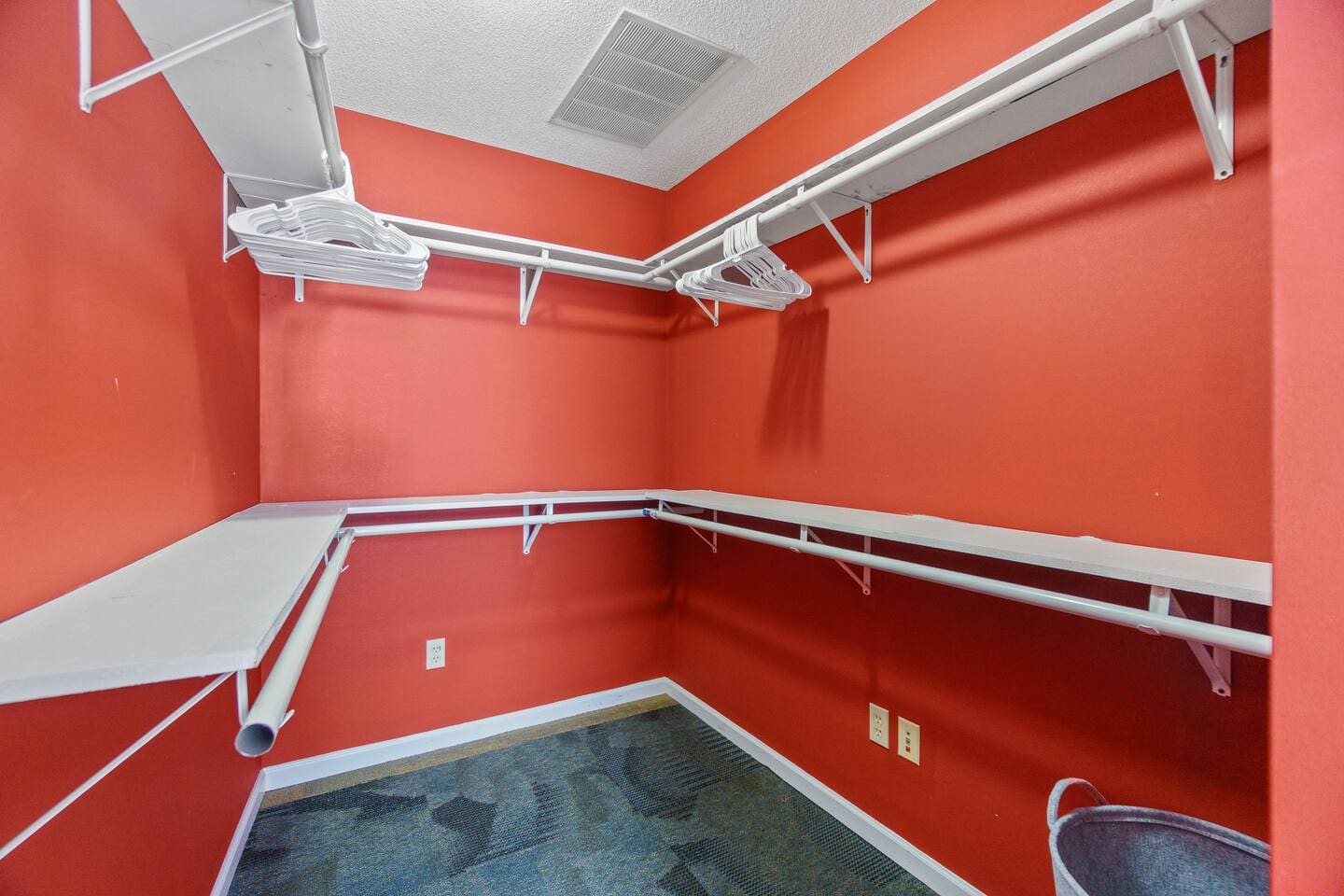 Ample clothing storage with a dresser, closet, or wardrobe, providing plenty of space to keep your items organized during your stay.