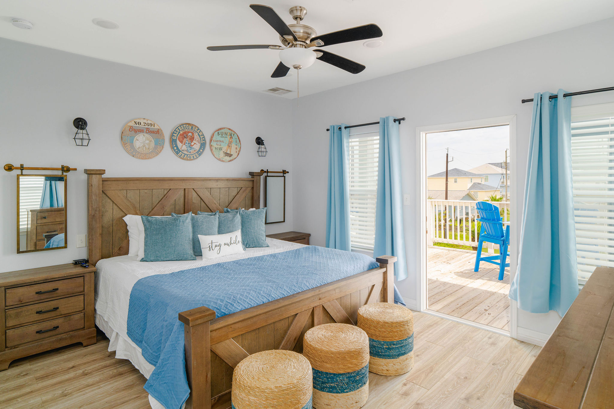 King Guest Suite upstairs — rustic wood headboard, King bed, private ensuite. The second grown-ups' retreat.