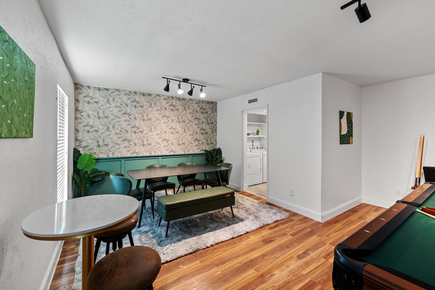 This dining-meets-game room combo brings together dinner and entertainment in one stylish space.