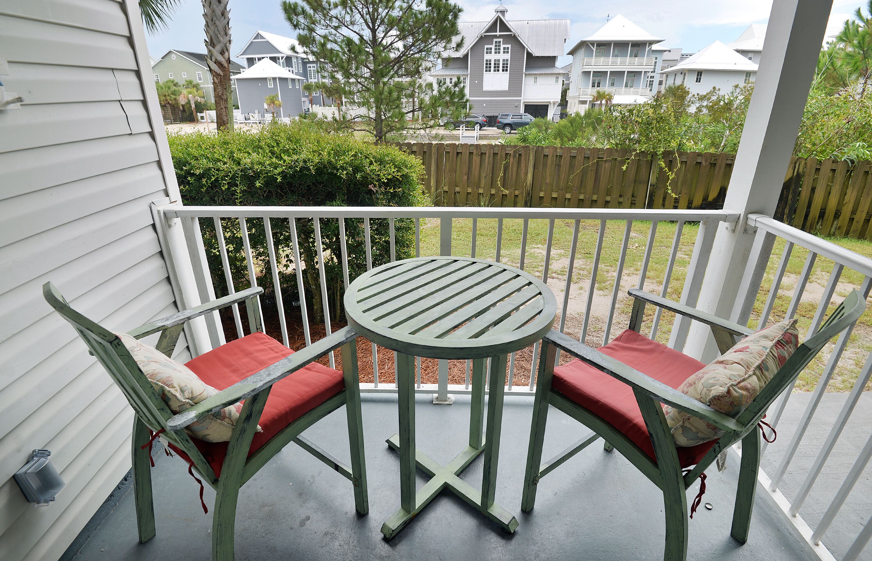 Patio looks over green space