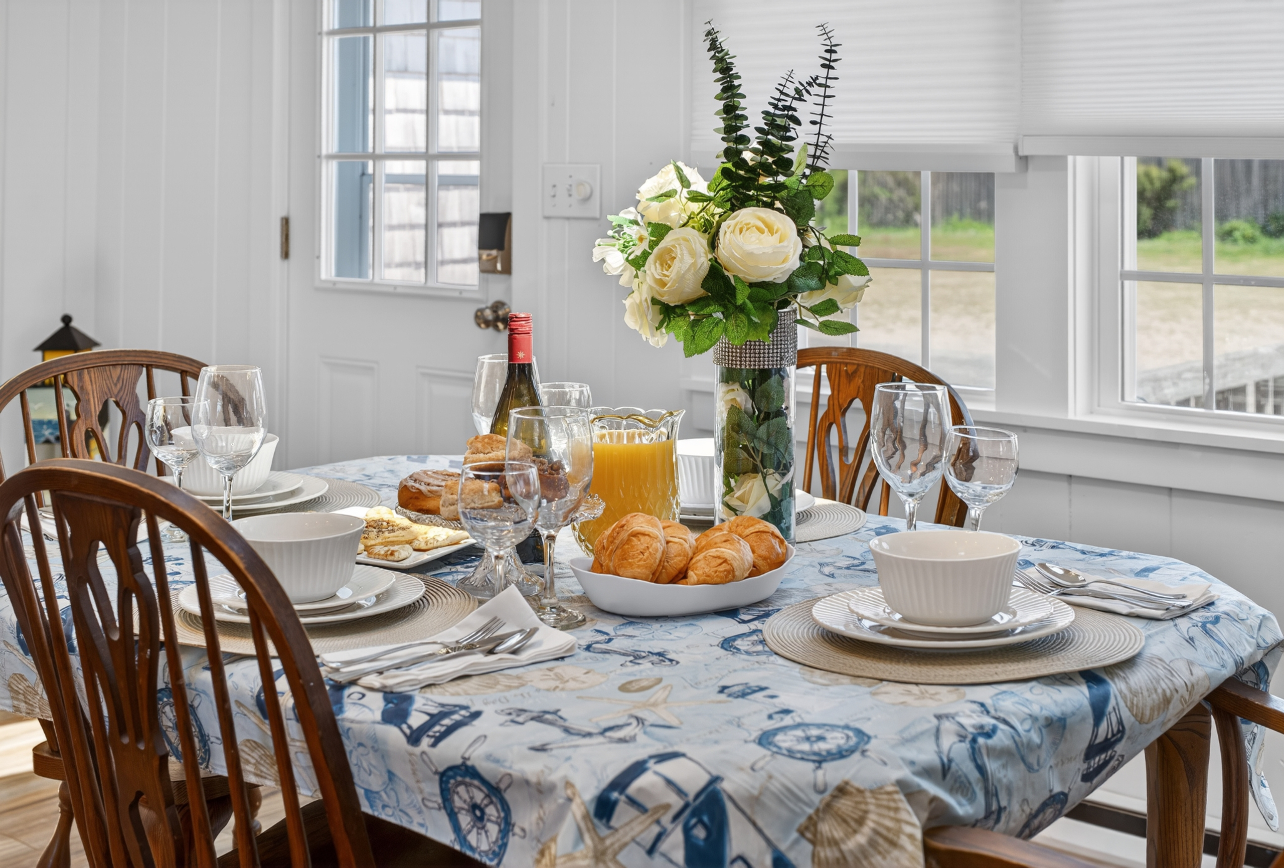 Intimate dining space for four, perfect for special occasions and shared moments.