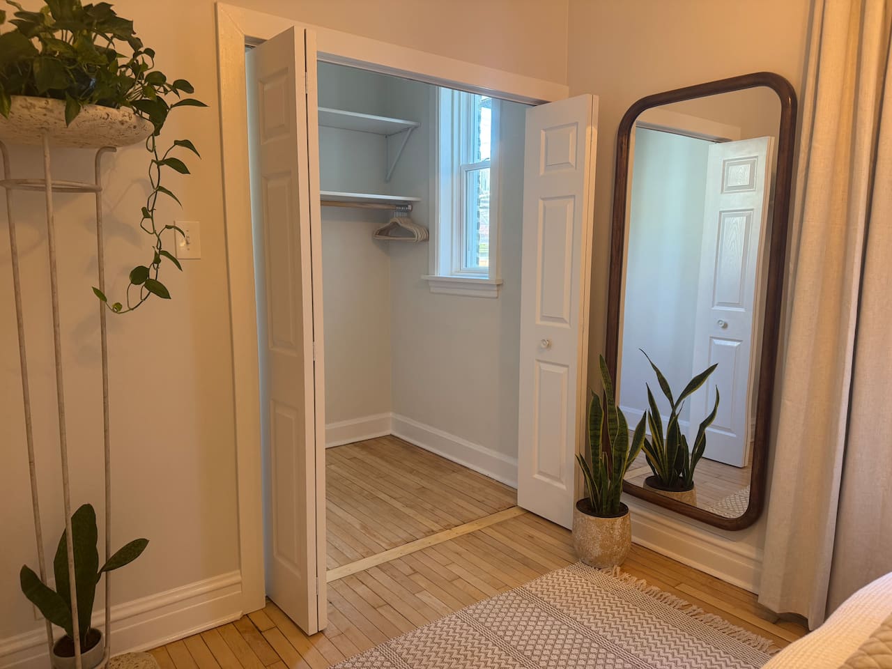 Bedroom detail showing closet and decor