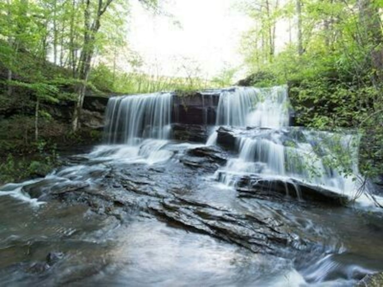Waterfall directly across from the private beach Mirror Lake: Look for the Nature Walk Sign!